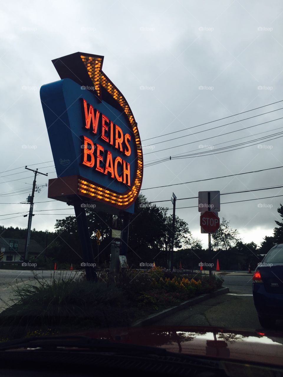 retro sign glowing on a gloomy New Hampshire day