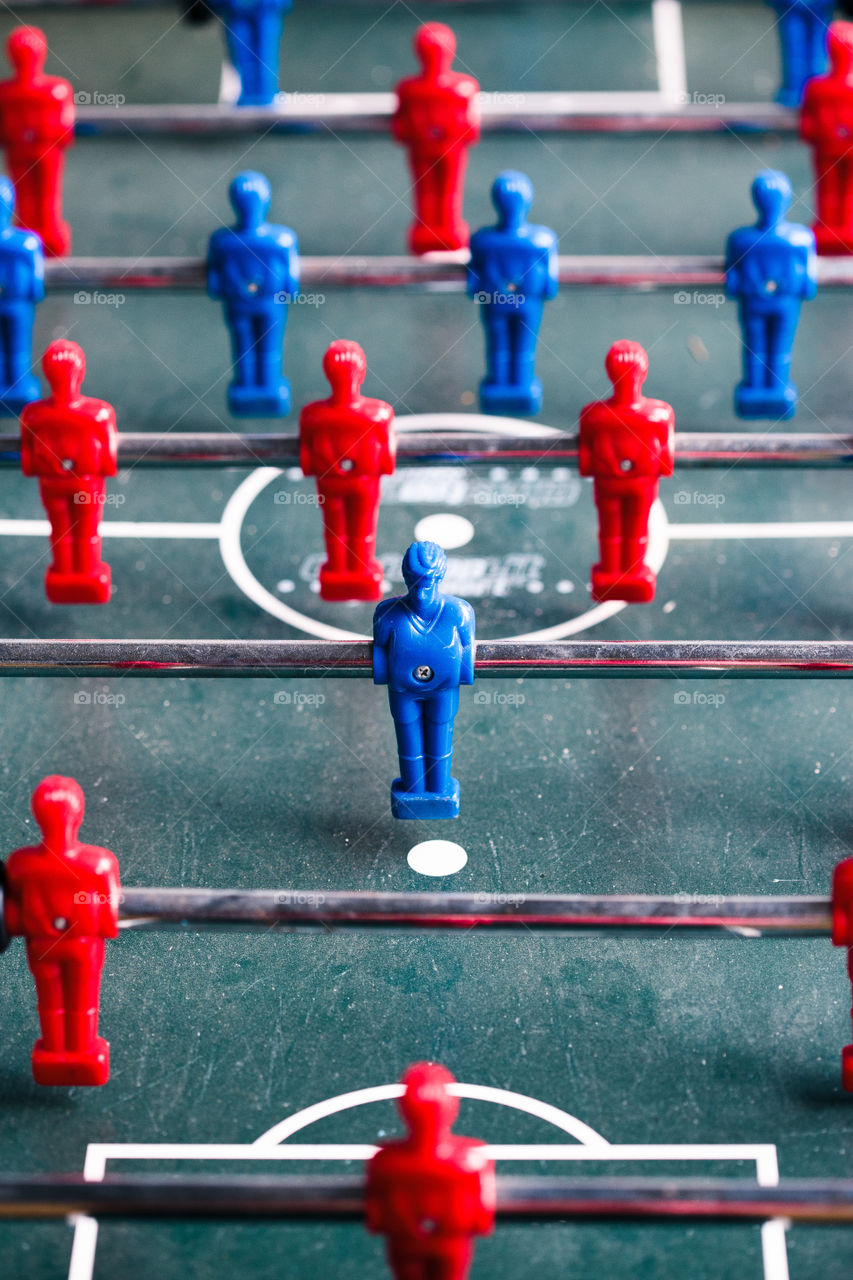Table football game sport competition two competitors players on field. Closeup of players