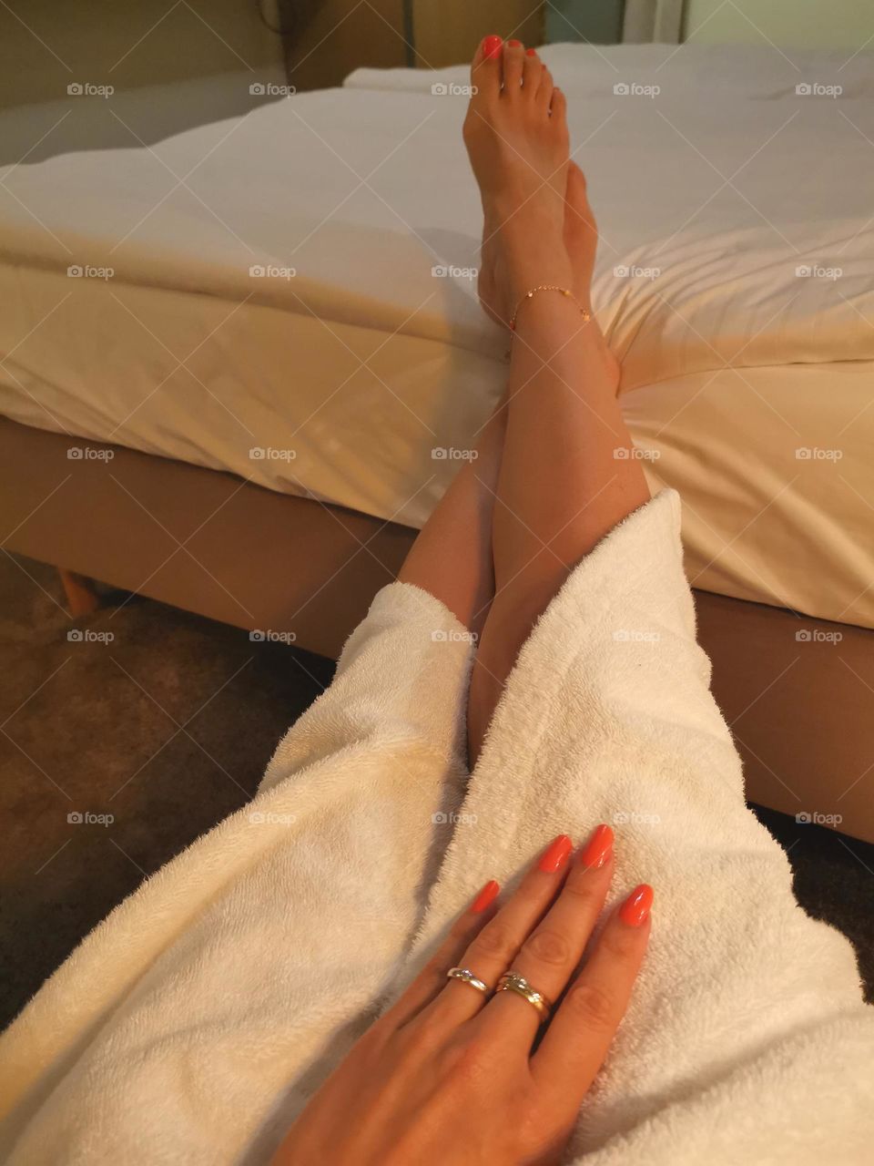 Photo of hands. Manicure. Photo of legs and feet. Relax and rest.