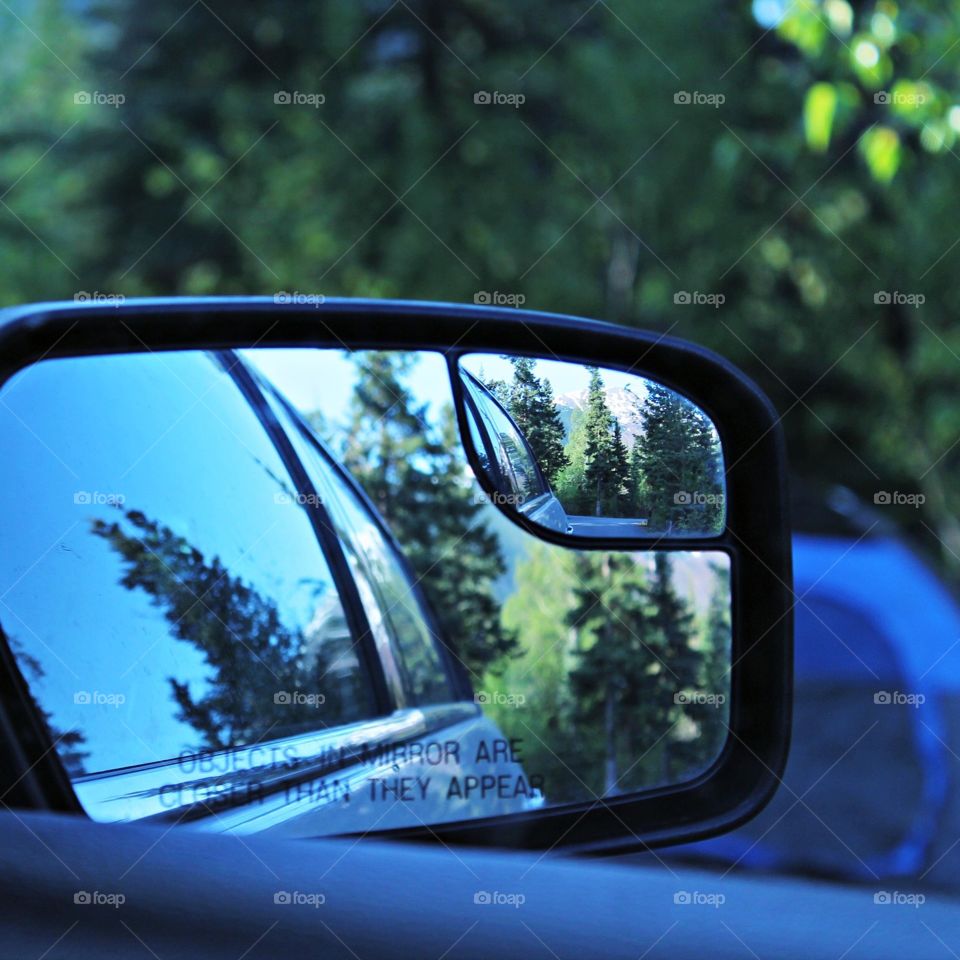 Reflection . Camping in Alaska and hiding from Mosquitos 