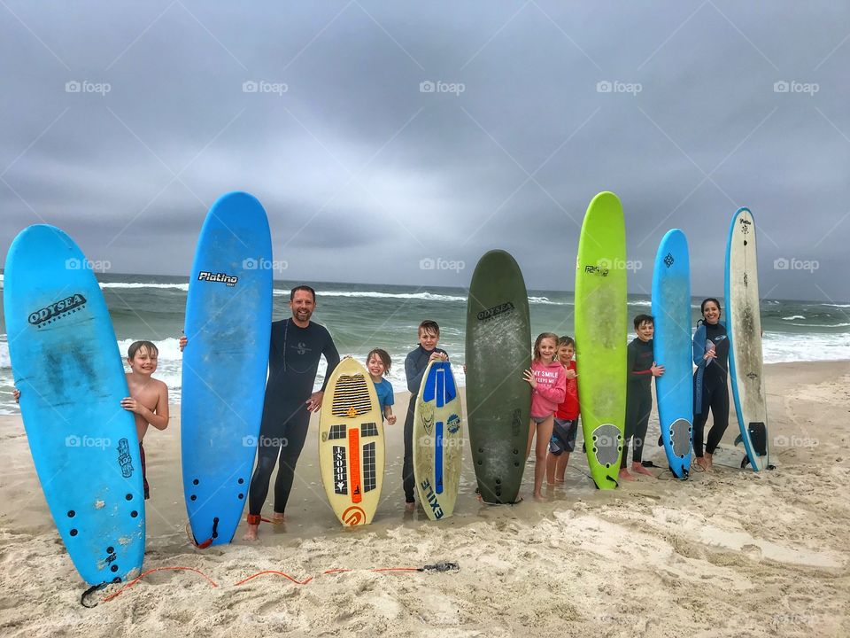 Family with surfboards