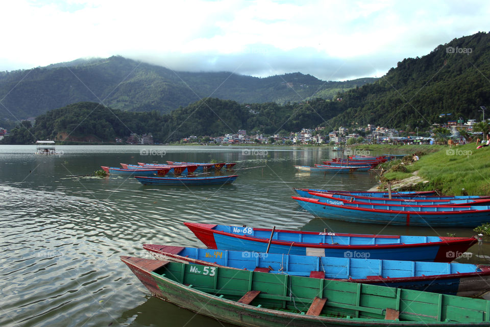 boats inside the fewa lake pokhara nepal