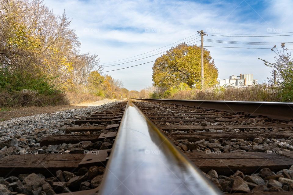 Looking down the rail of train tracks 