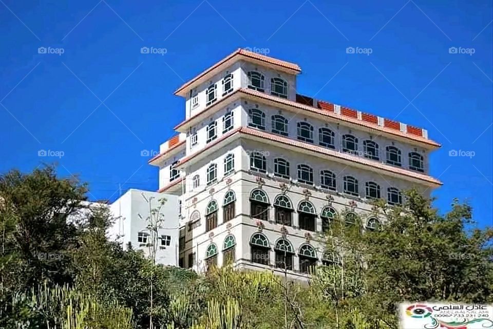 A stunning view of green mountains covered in fog in Yemen