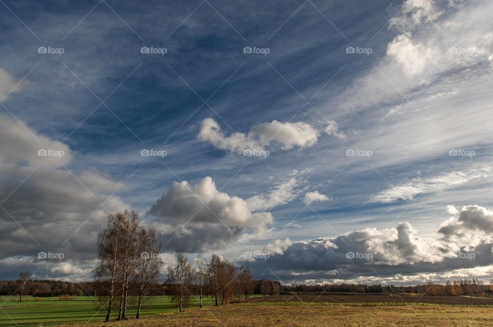 Autumn landscape with dramatic cloudy sky