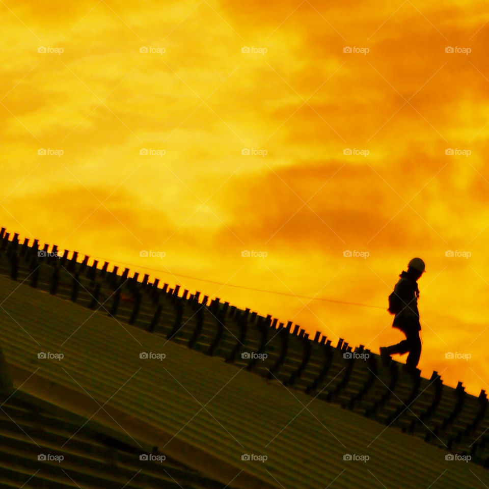 Lone worker on a high roof...