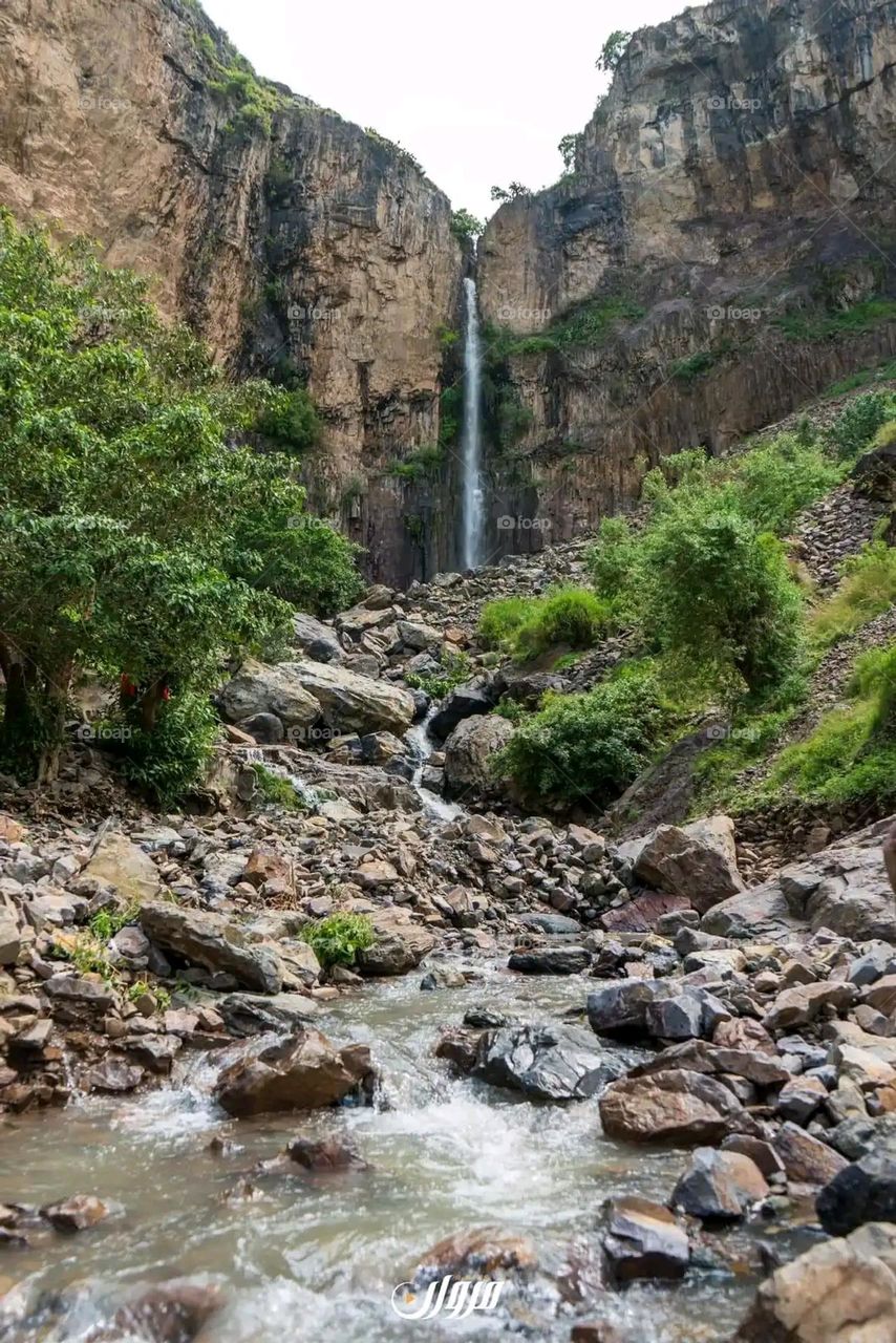 Glory be to God, the magnificent and picturesque view and the natural green trees are a view that is nothing more wonderful than it