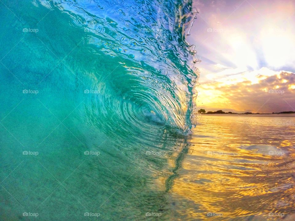 Close-up of wave during sunset