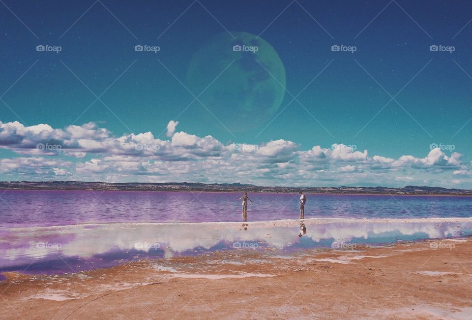 Pink salt lake and the moon