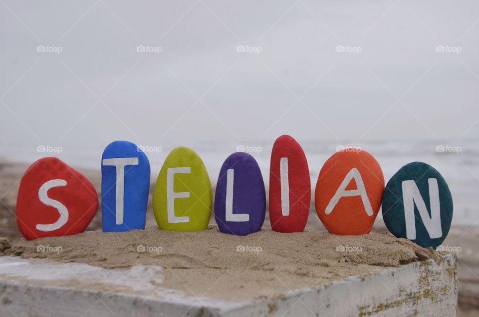 Stelian, baby boy name on colourful stones meaning pillar