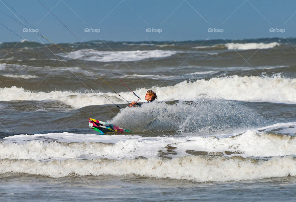 Kitesurfer on a stormy day 