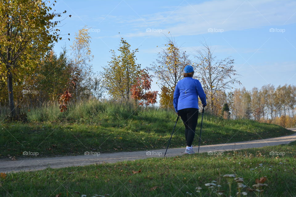 woman walking sport time landscape, social distance