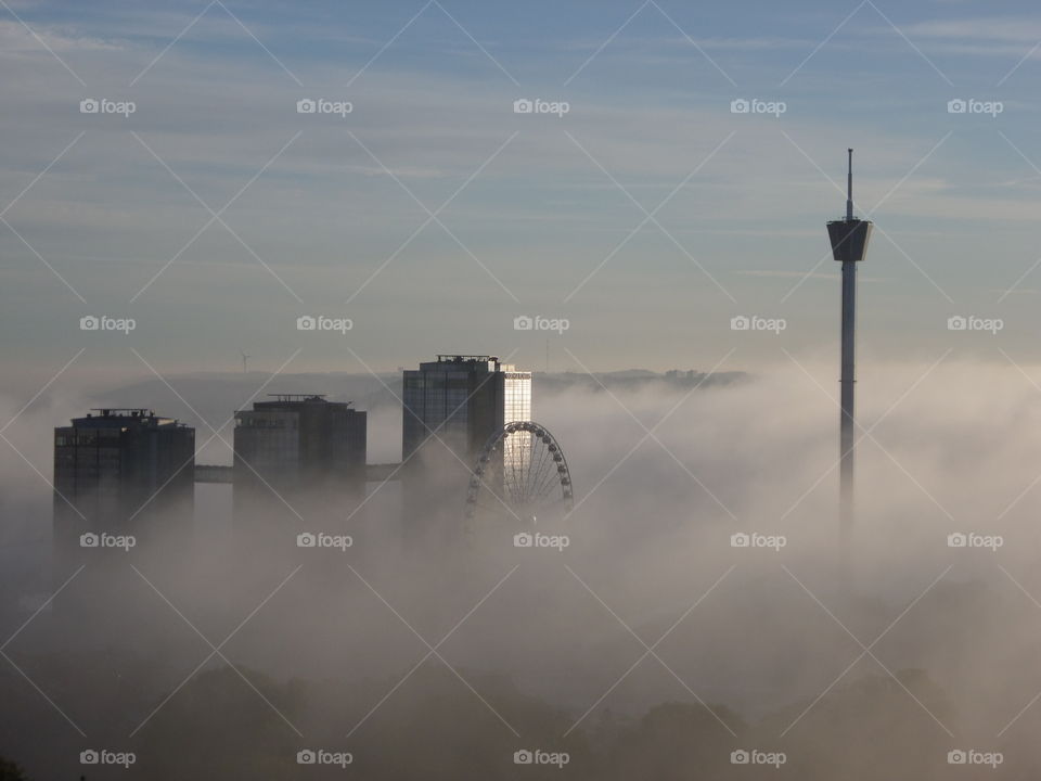 The misty Gothia Towers and Liseberg tower