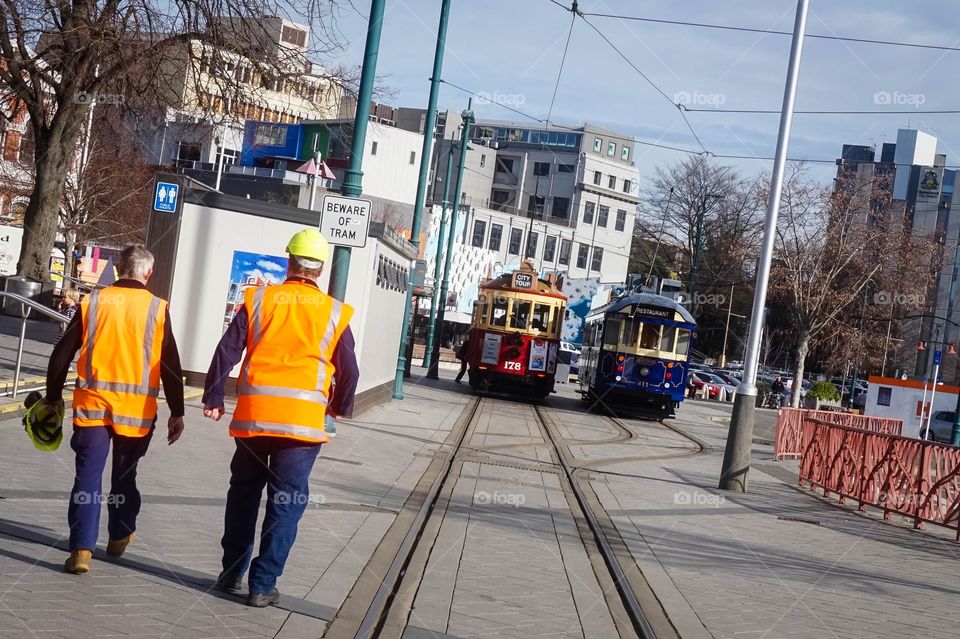 Construction workers and tramcars in Christchurch, New Zealand 