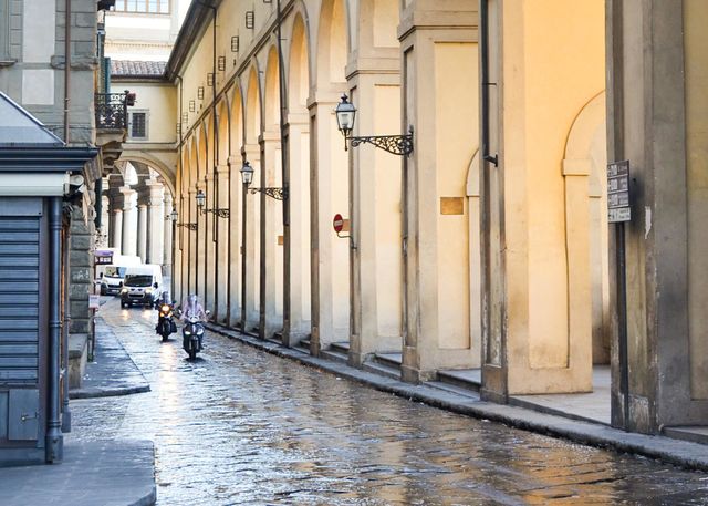 Man Ride Motorcycles on City Road, Florence