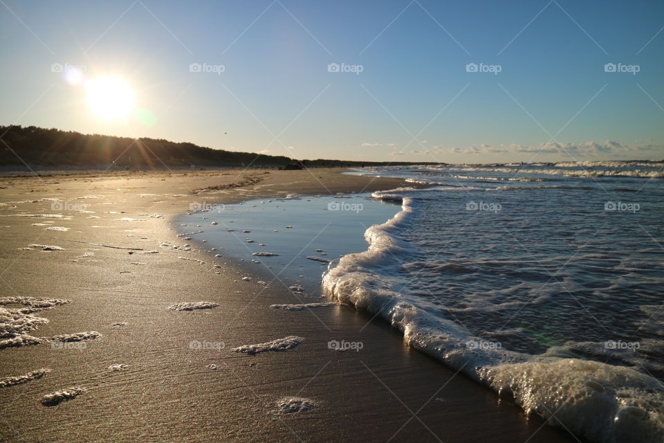 Summery sunset on the wonderful beach of Karlshagen on the island of Usedom in Germany
