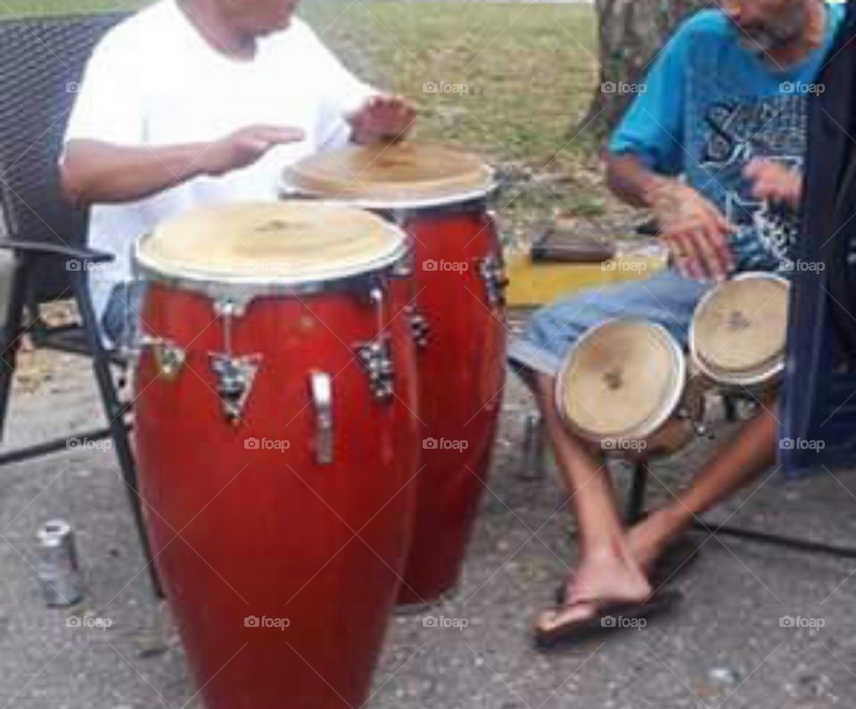 Congo Time. Two friends and former neighbors of mine in the parking lot, playing their congos.