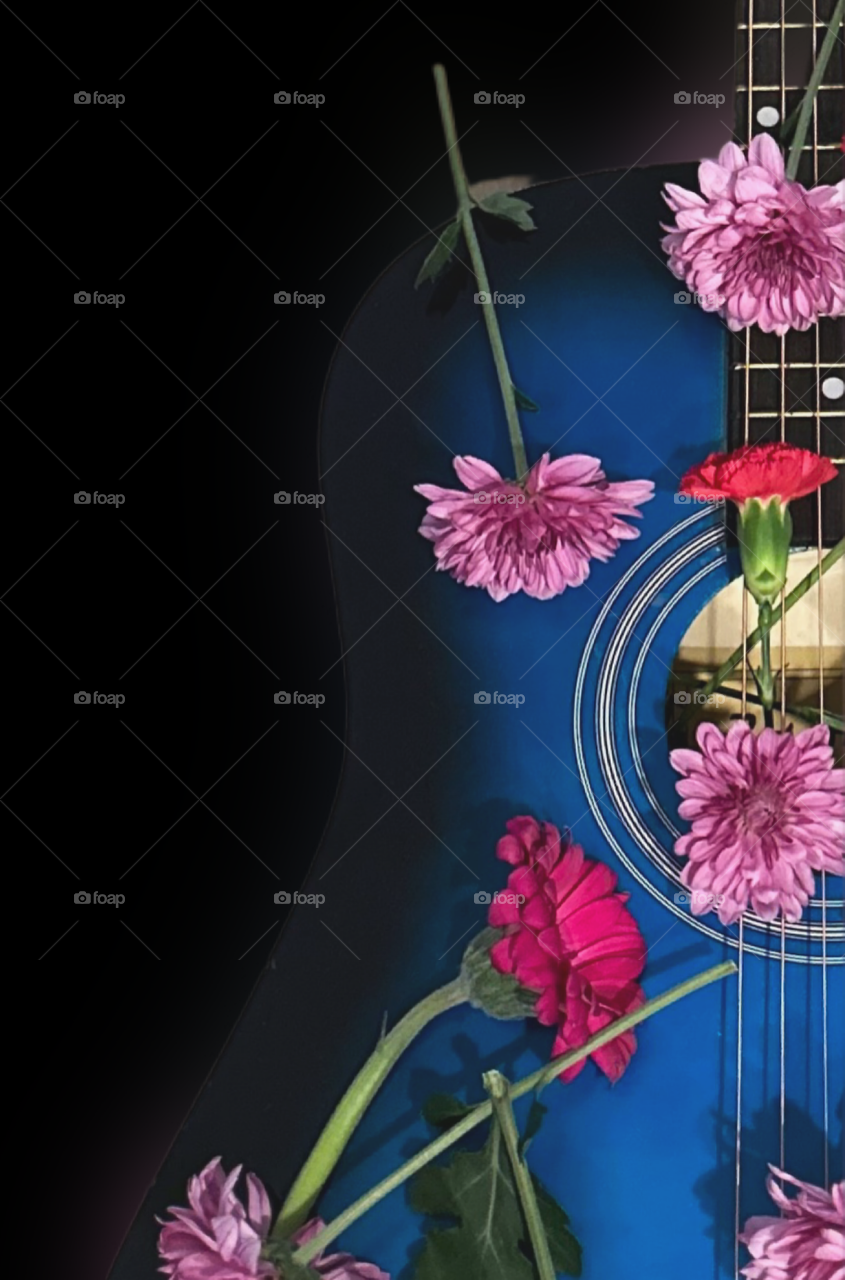 BLUE GUITAR WITH BLACK BACKGROUND 