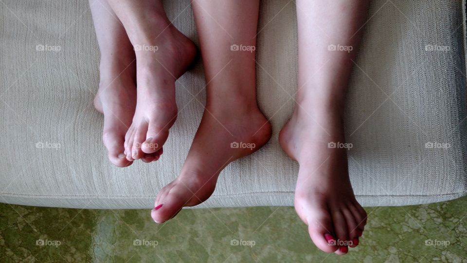 whose feet?