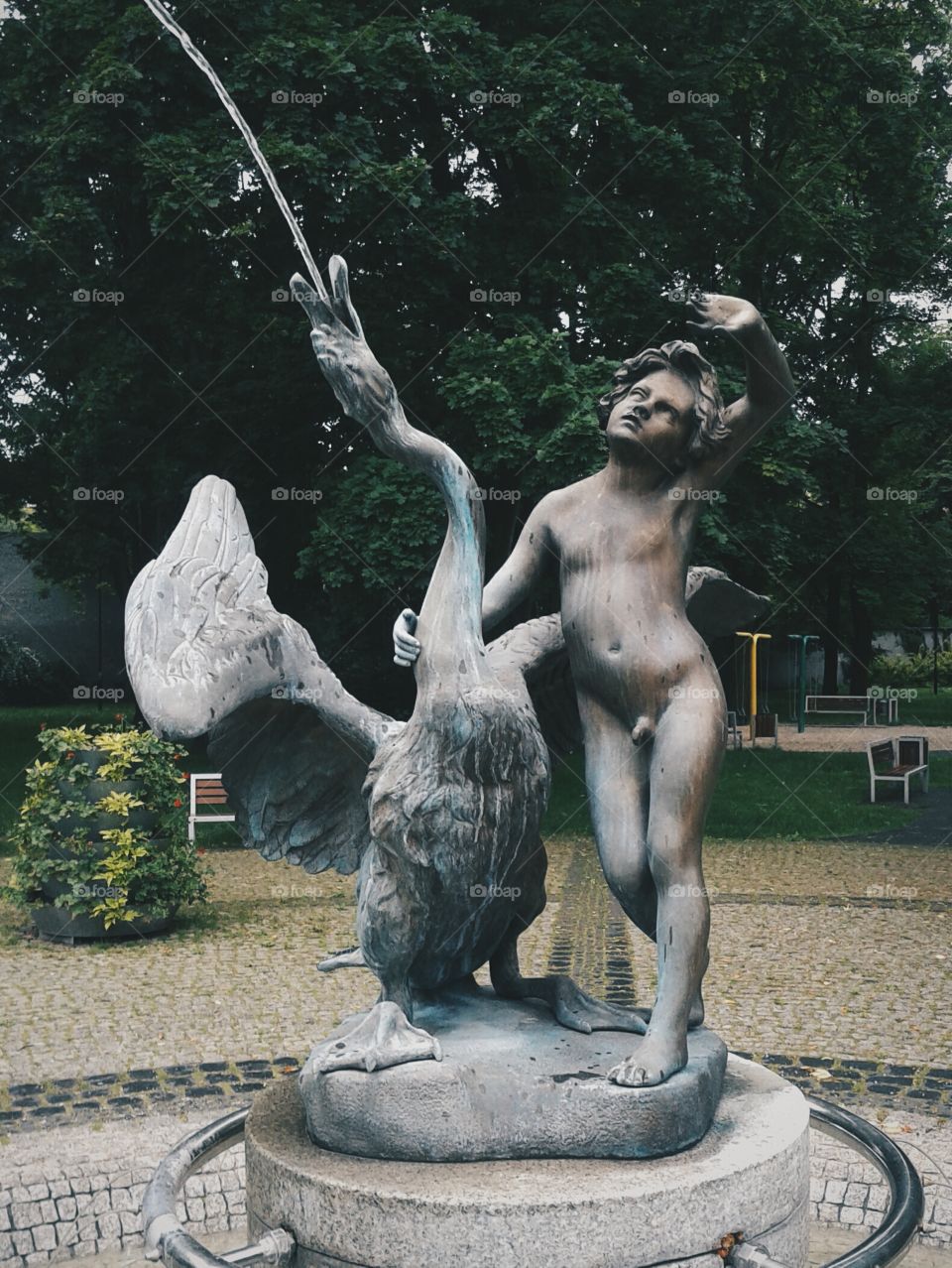 Boy with a Swan.
Sculpture of Theodore Kalide.