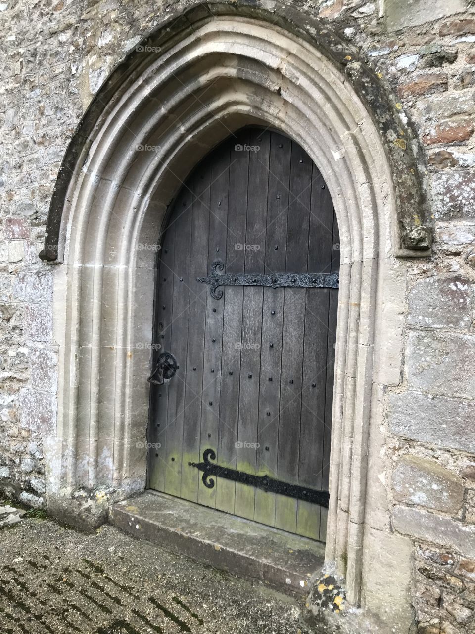 Entrance door, angled to the magical church of St Michael in Shute, Devon,