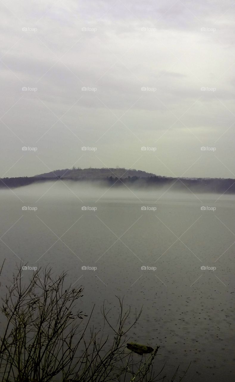 Gray mist on the pond