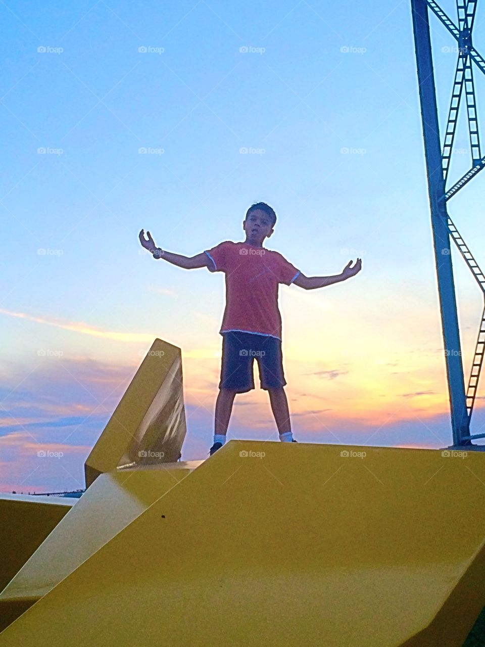 Boy on top of the world 