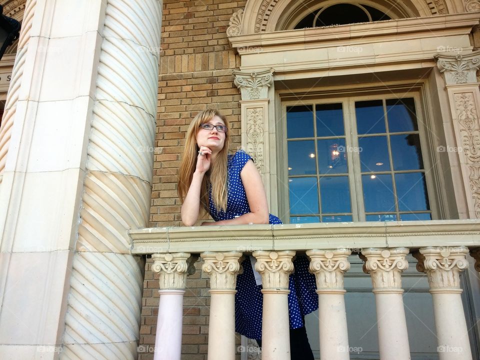 library daydreams. daydreaming on the rails of the historic library in Hillsboro, Texas, modeled after a foundling house in Florence, Italy