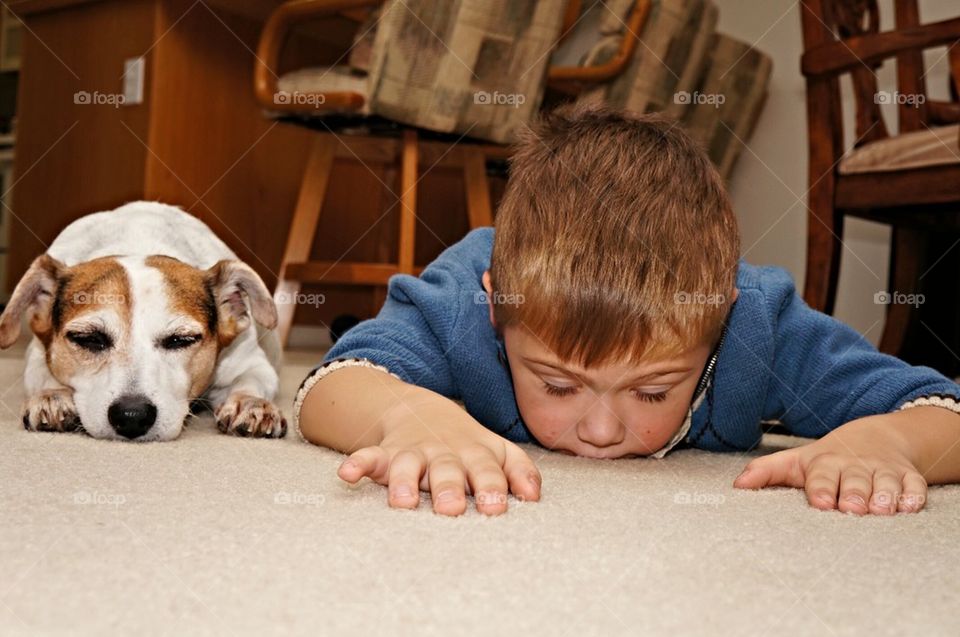 Kid spending time with dog