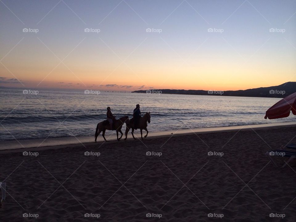 Sunset horse riding