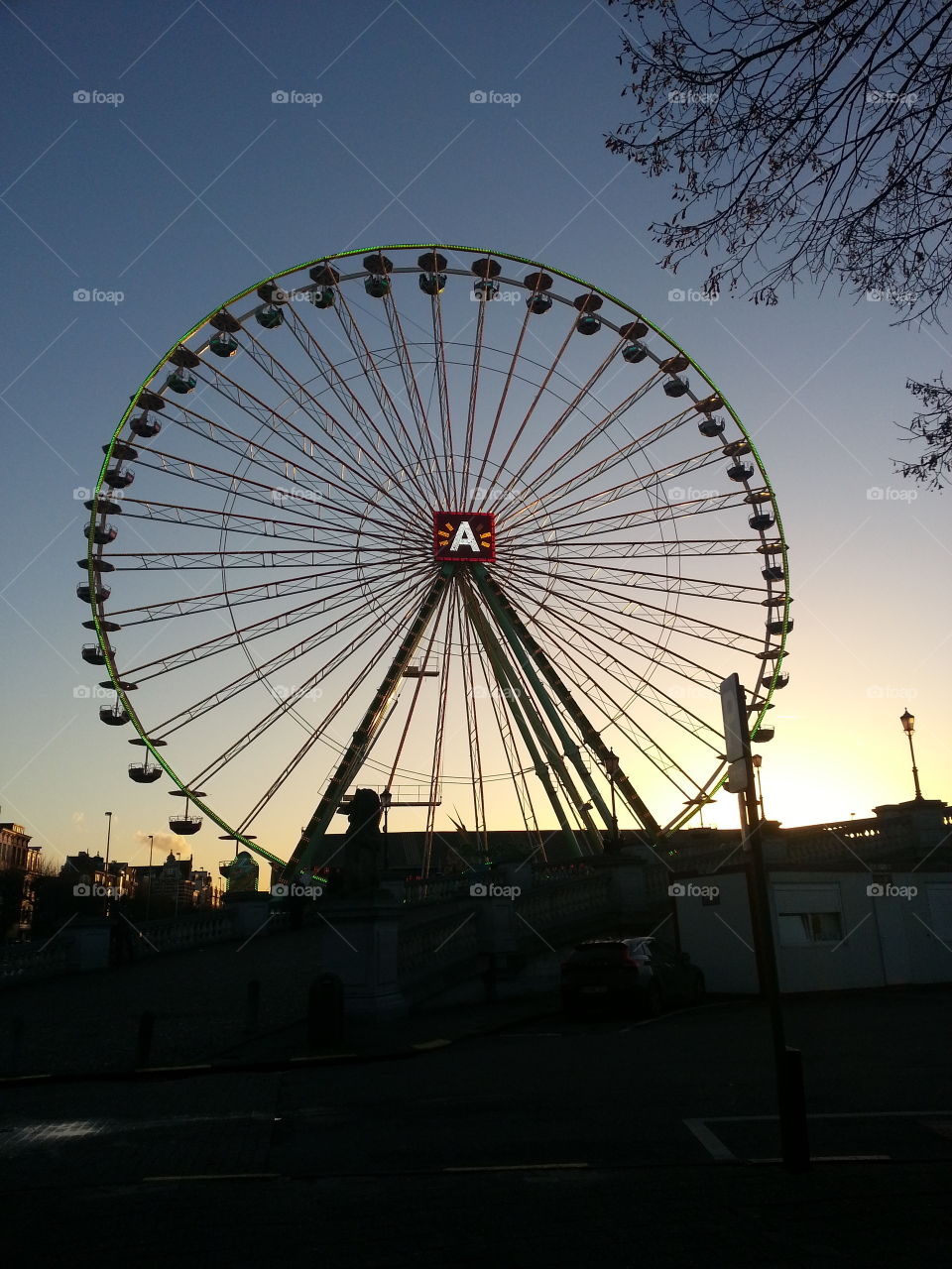 ferris wheel antwerp by sunset