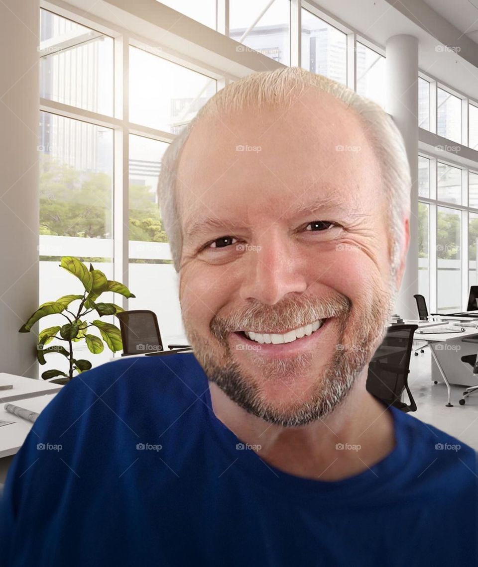 Cute guy with a beard at the office.