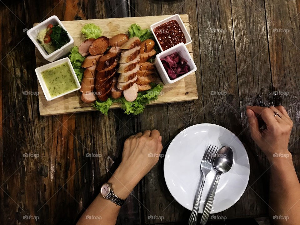 Four types of hotdog grilled serve with four sauces hot and spicy that wake you up with amzing taste.
