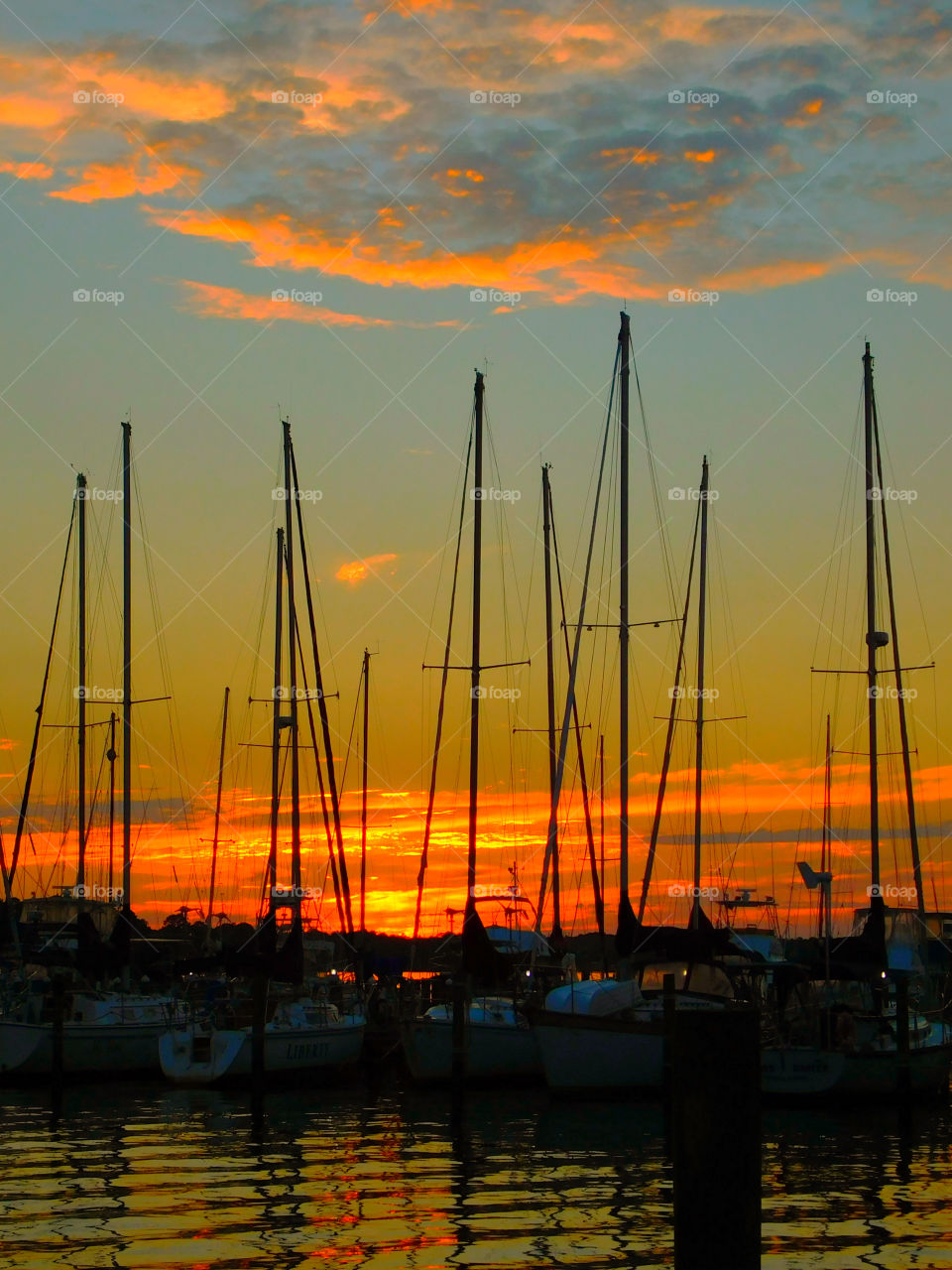 The sky was filled with the most brilliant orange complimented perfectly with hues of gold, yellow, red and crimson. An orange haze had casted over the water, reflecting off every wave.  Finally,the sun disappears along with the shine. I can only wait to see another magical moment of beauty and warmth! I can only wait for another sunset! Enjoy!