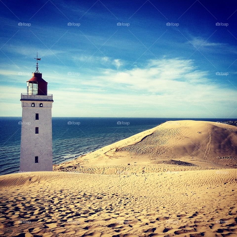 Lighthouse in sand bank