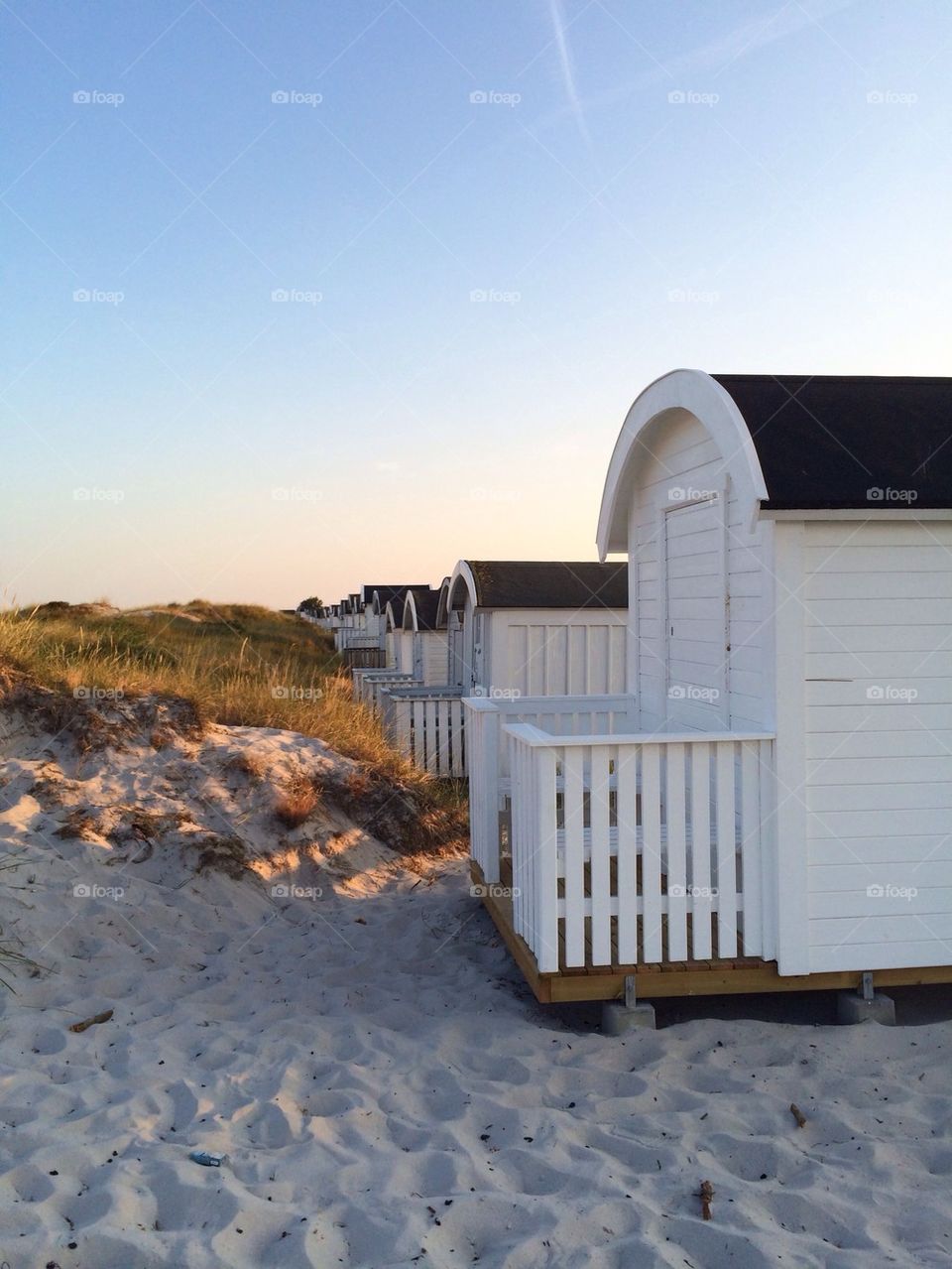 Beach huts on sand dune