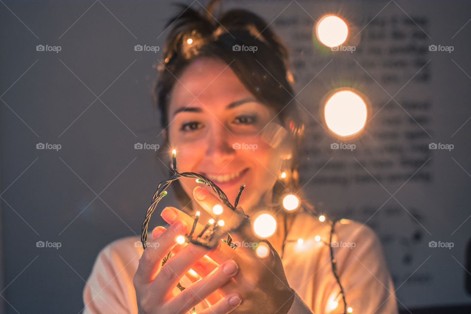 Beautiful girl holding led lights