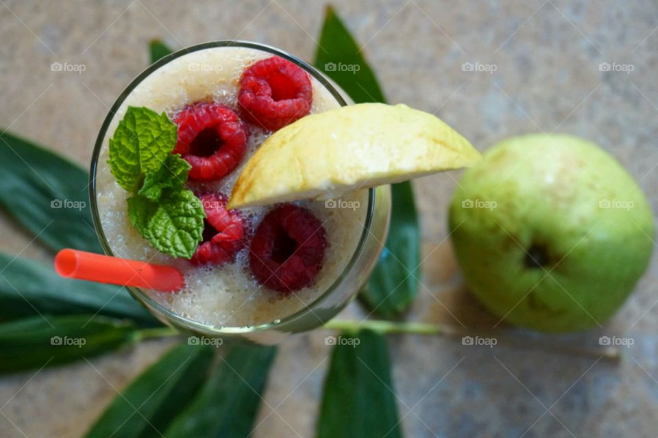 Fresh Fruit Smoothie - Guawa-Pink Lemonade Smoothie topped with raspberries and mints