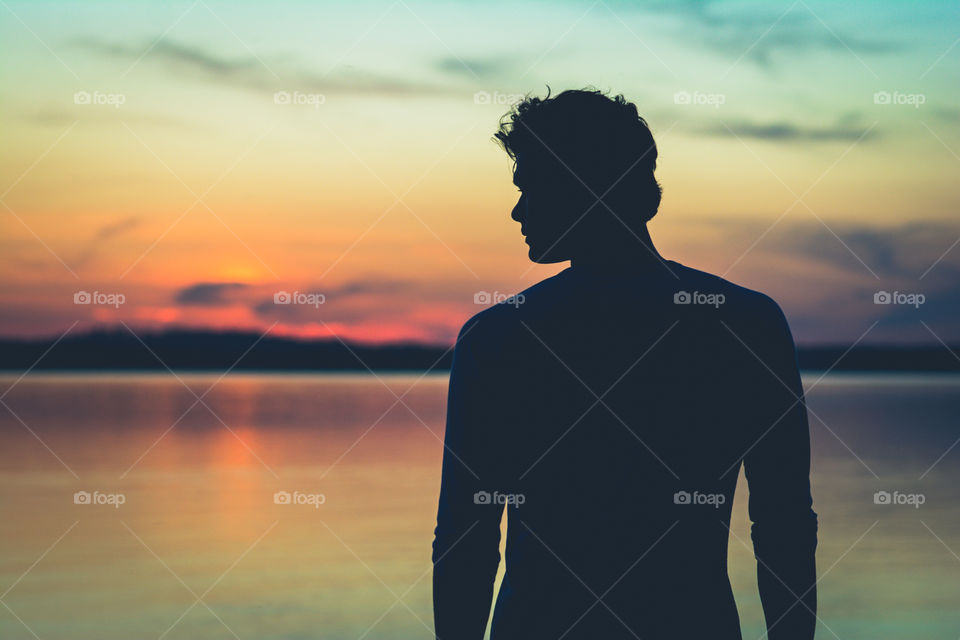 Silhouette of a Man During Sunset on the Tennessee River