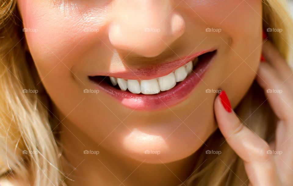 beautiful woman with white teeth smiling