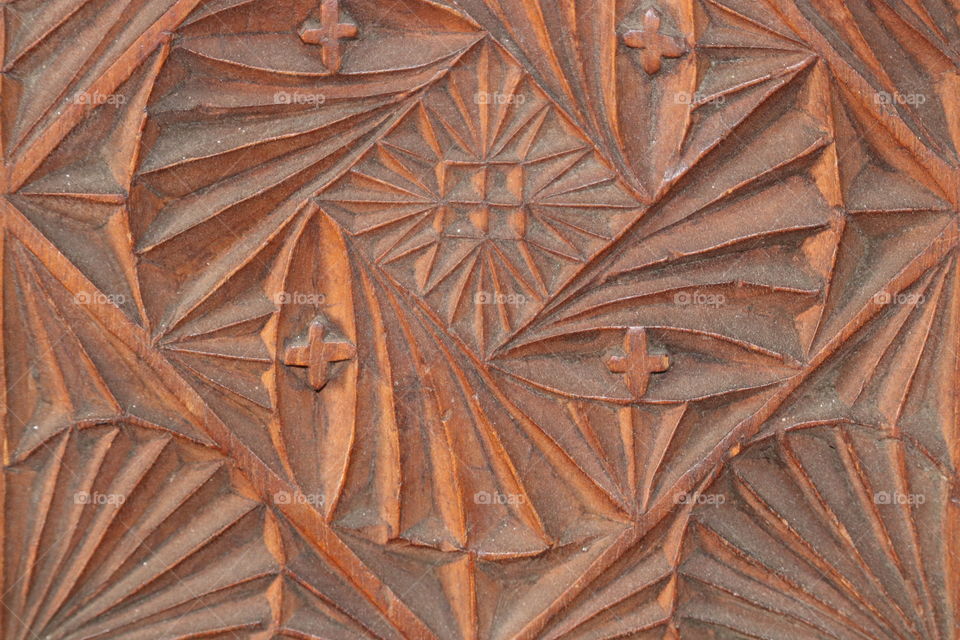 Dusty surface of antique moulded cast iron fireplace front