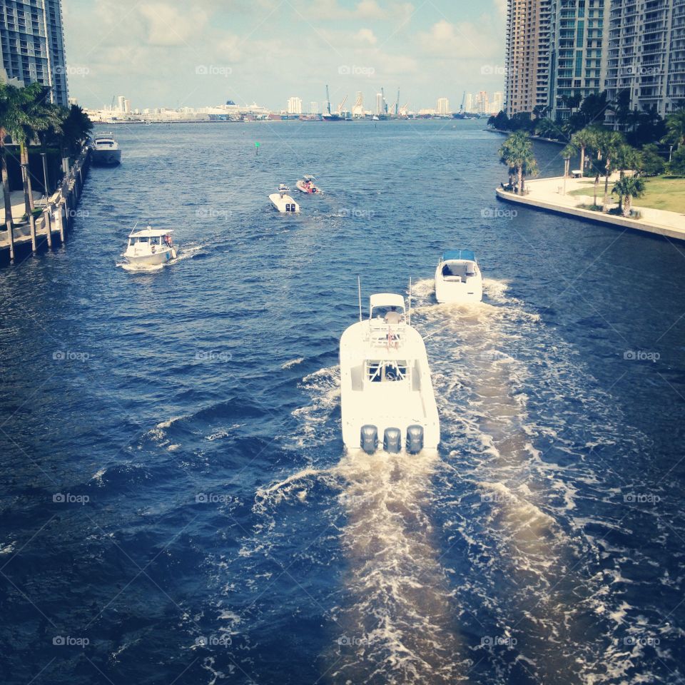 Boats through Brickell bay Miami Fl