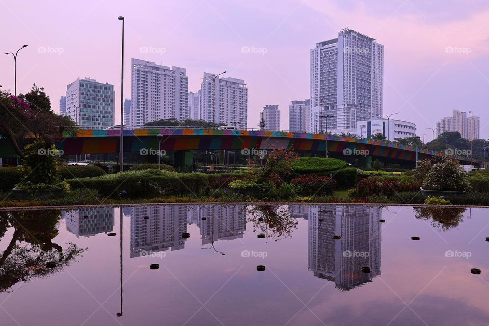 beautiful reflection of skyscrapers in urban area