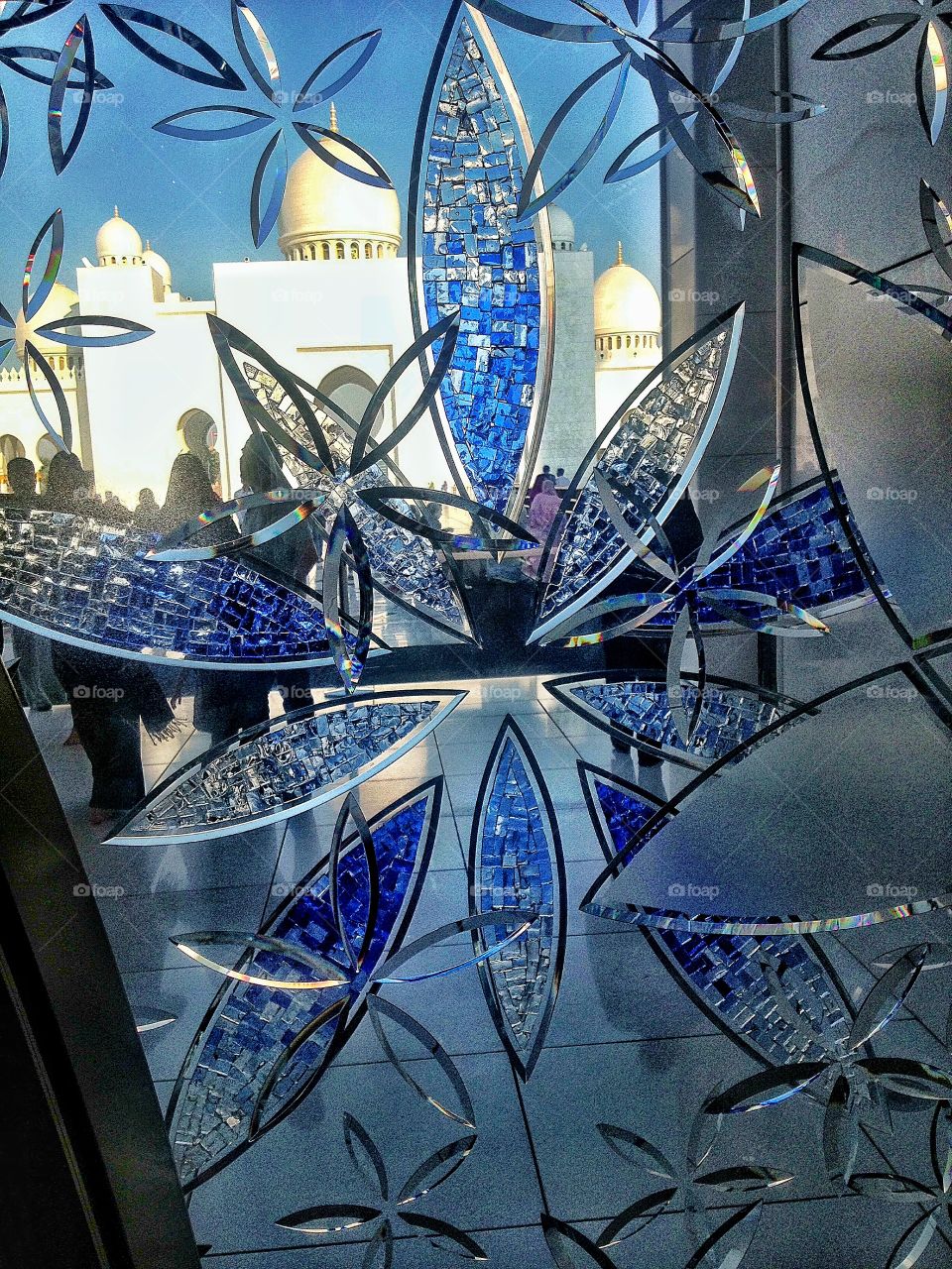 Silhouettes through Mosque window