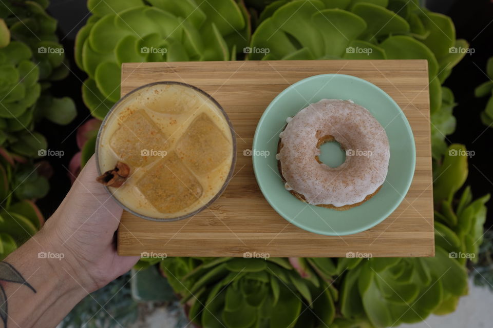 Coffee and a doughnut. 