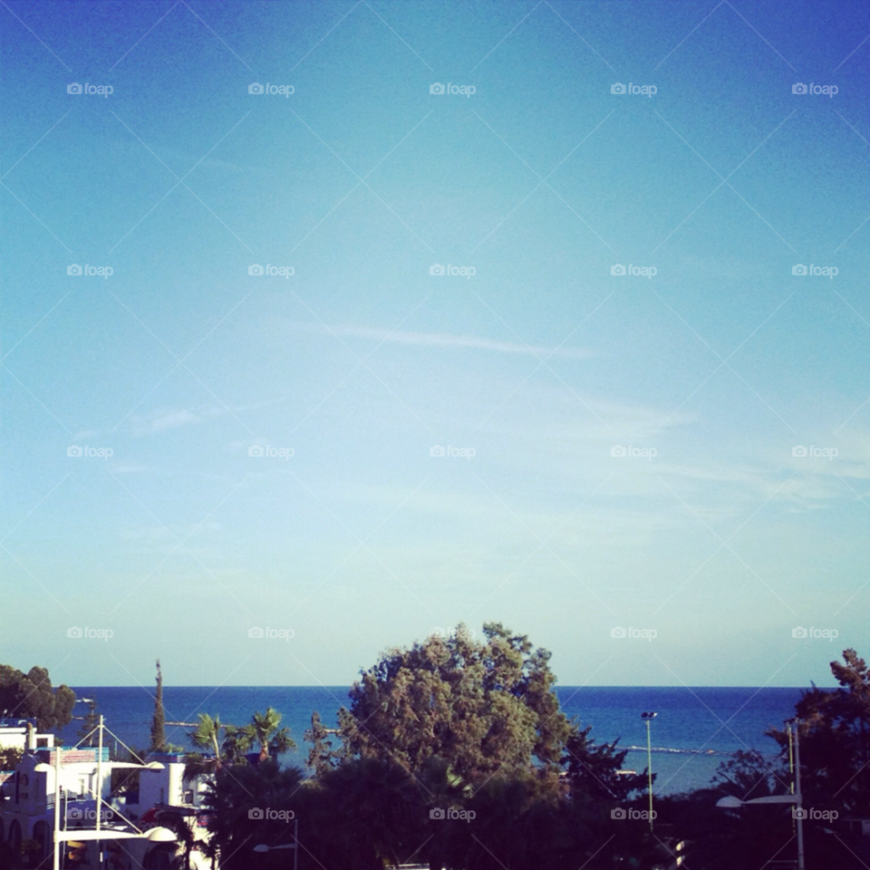 sky blue clear sea by gkallis23