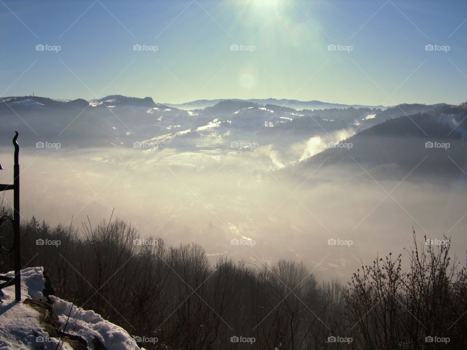 Scenic view of mountain during foggy weather