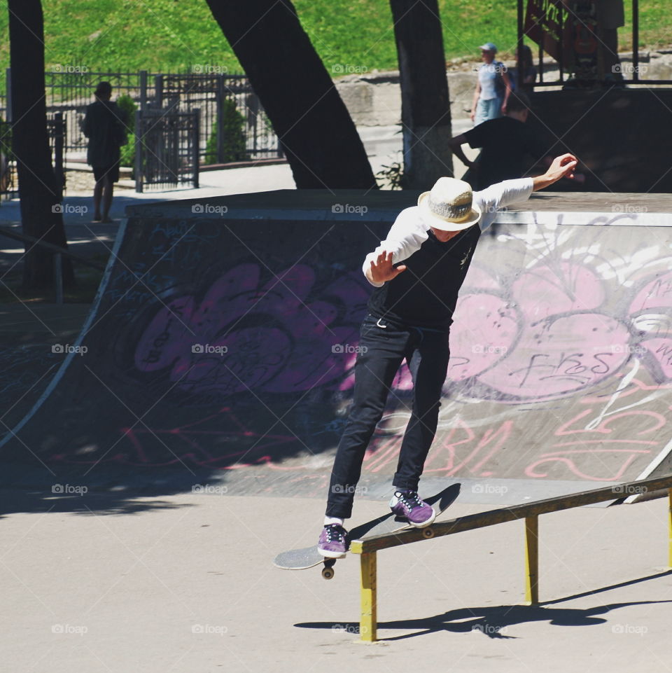 Skateboarding. Boy moving on the scateboard