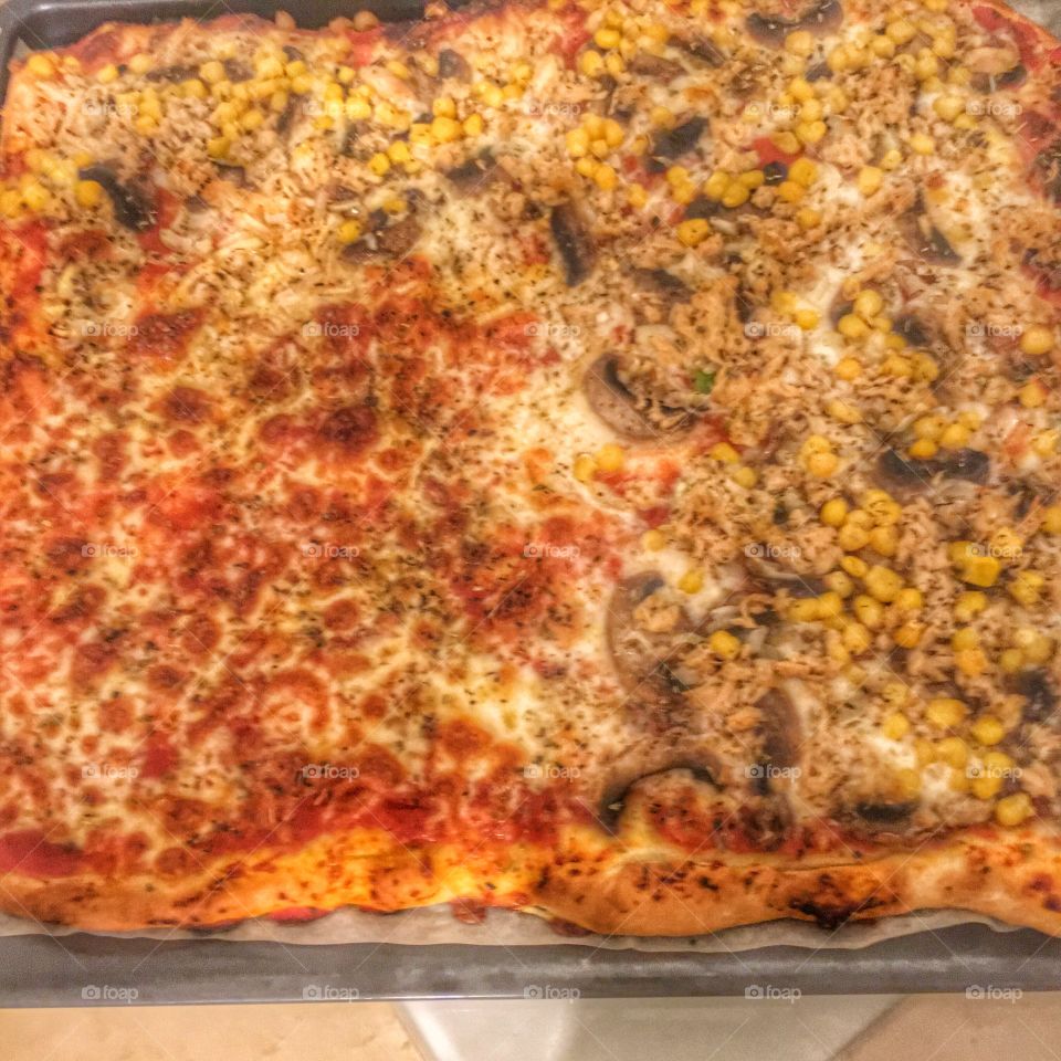 Homemade Pizza prepared with fresh vegetables