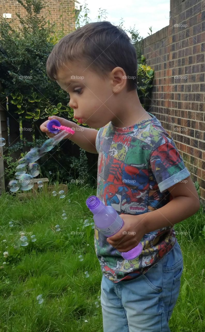 blowing bubbles